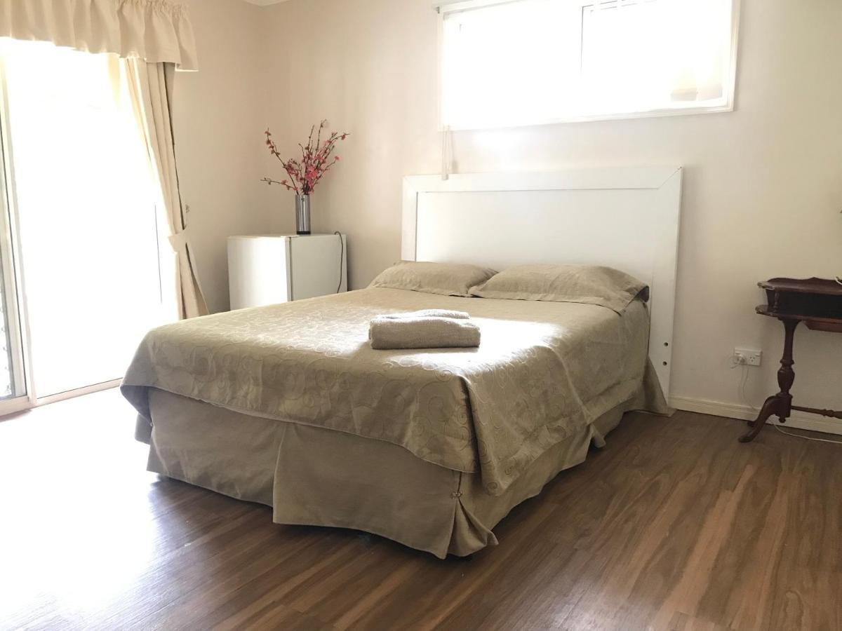 Theme Parks Amituofo Homestay Gold Coast Extérieur photo