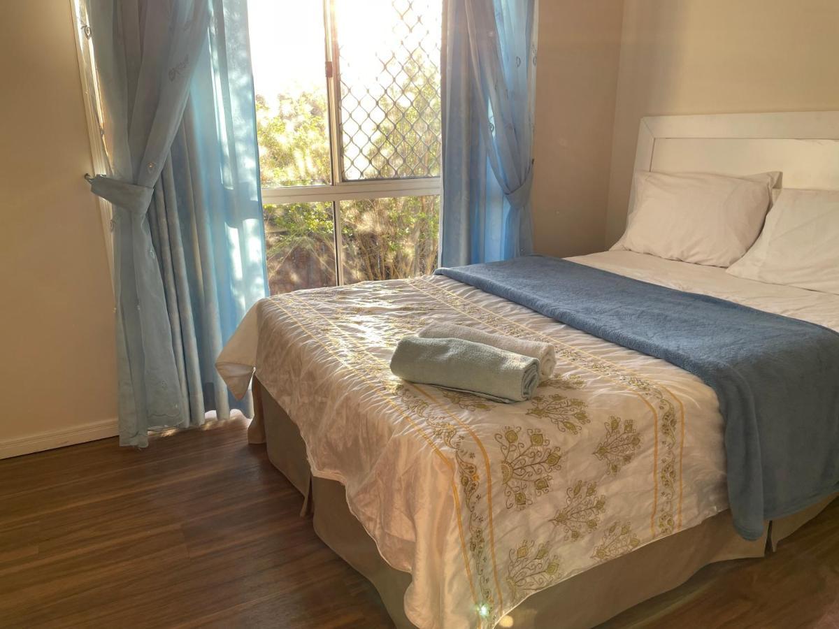 Theme Parks Amituofo Homestay Gold Coast Extérieur photo