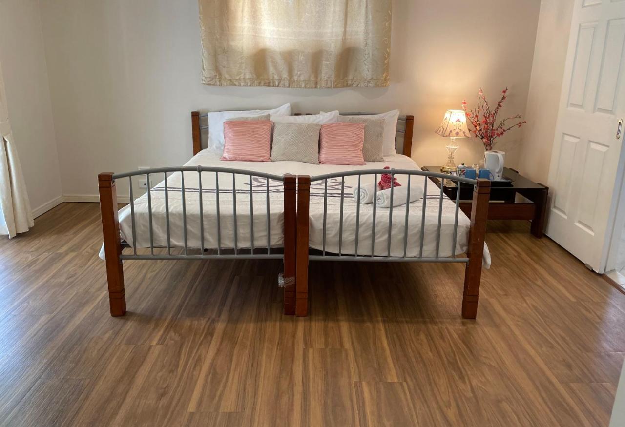Theme Parks Amituofo Homestay Gold Coast Extérieur photo