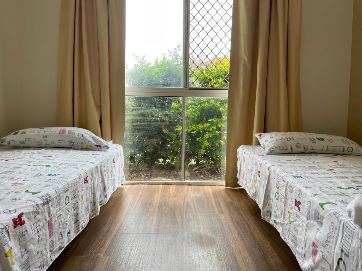 Theme Parks Amituofo Homestay Gold Coast Extérieur photo