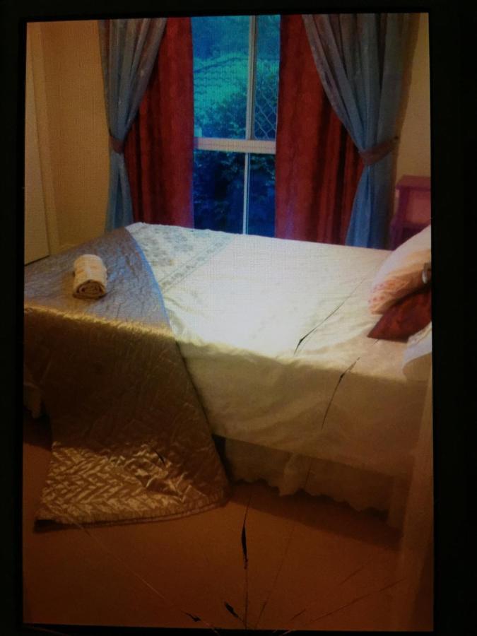 Theme Parks Amituofo Homestay Gold Coast Chambre photo